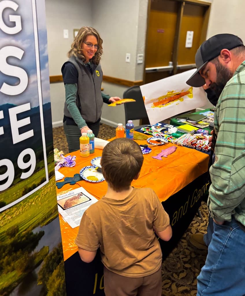 Kids painting at a family-friendly vendor activity